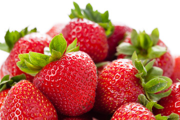 Rip strawberry on white background