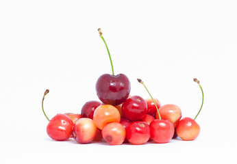 Pile of yellow and red cherries