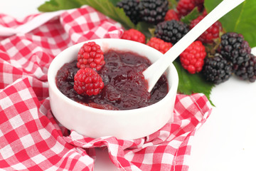 Jam with fresh raspberries and blackberries