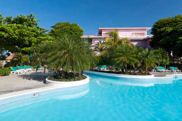 Tropical resort at swimming pool in Mexico