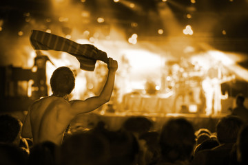 Audience cheering at live pop concert