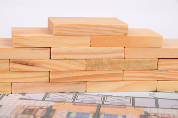 Wood bricks and blueprint