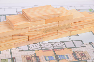 Wood bricks and blueprint