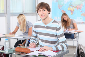 Teenage students working in classroom