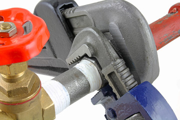 wrenches on iron pipework