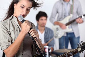 Woman playing in a band