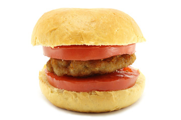 Small loaf with cutlet and tomato