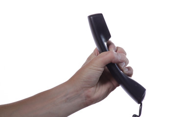 Hand mit Telefonhörer isoliert auf weiss