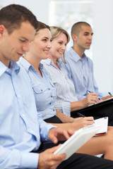 Group watching business presentation