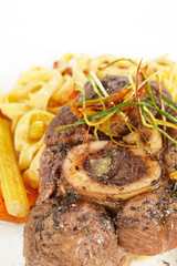 tasty steak with pasta