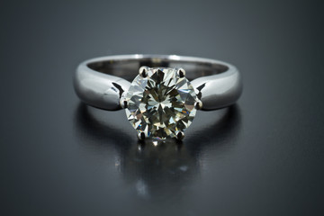Two carat diamond ring with a dark background
