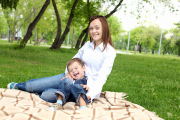 Mother with her son outside