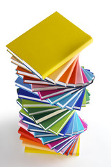 Twisted stack of rainbow colored books