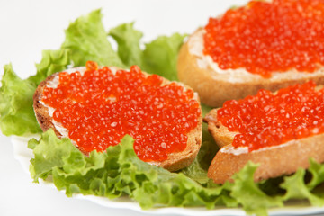 Three sandwich with red caviar