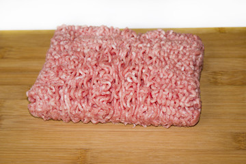 fresh minced meat on a cutting board