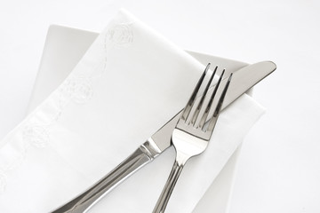 Fork, Knife and White Napkin Table Setting