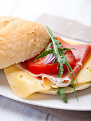 Sandwich with prosciutto crudo and cheese