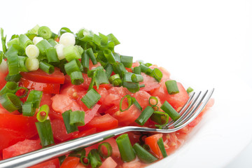 Tomato salad with spring onion