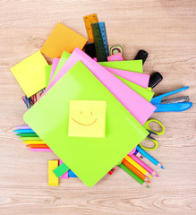 bright stationery on wooden background