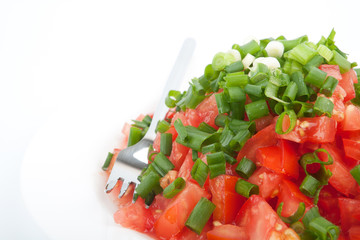 Tomato salad with spring onion