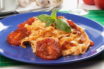 Pasta milanese with basil and tomato