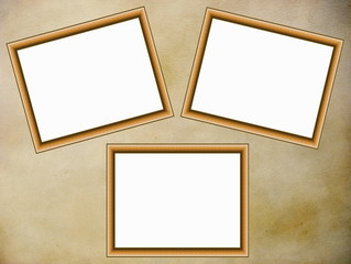 Three wooden frames on parchment background