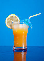 citruscoctail drink with ice cubs