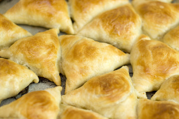 Midle Asian pies with meat, samsa on white background