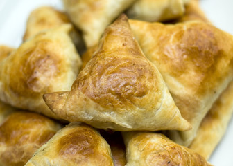 Midle Asian pies with meat, samsa on white background