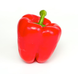 Bright red pepper isolated on white.