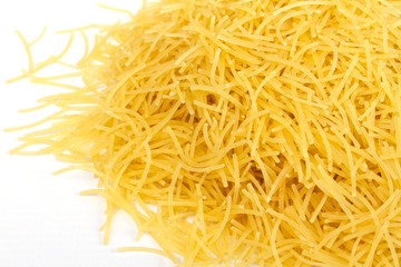 close up of a dried italian pasta on white background