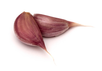 Garlic cloves on the white background