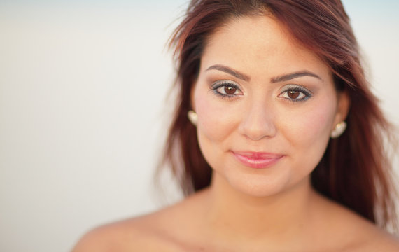 Headshot of an attractive young latina