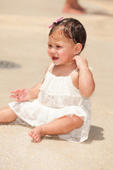 Cute baby girl outdoors in a water park