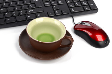 Computer keyboard and cup of tea