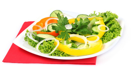 vegetable salad on plate isolated on white