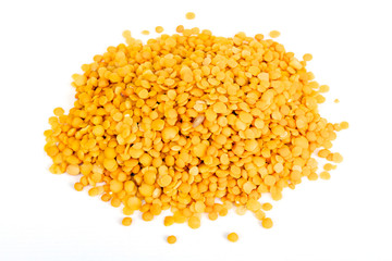 Yellow lentils isolated on white background.Macro shot.