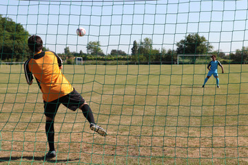 goalkeeper catching ball