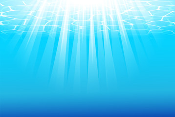 Blue underwater background with sunbeams