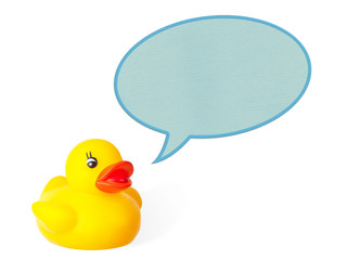 Cute yellow rubber duck talkinkg (blue paper speech bubble)