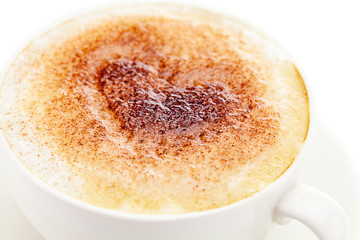 cappuccino in a cup in the shape of hearts isolated on white