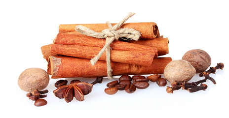 cinnamon, coffee and nutmeg isolated on white