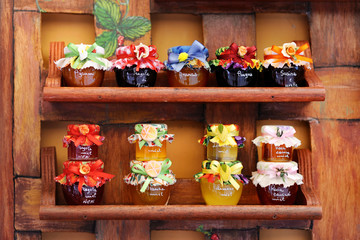 Colorful jam jars arranged for sale