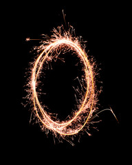 Letter O. Real sparkler alphabet