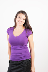 Fototapeta premium Portrait of charming young woman smiling over