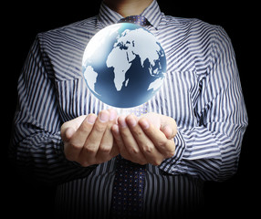 earth globe in his hands