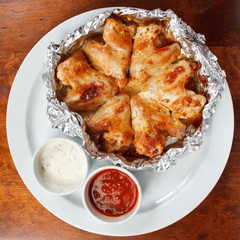 Chicken wings with sauce