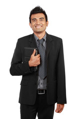 Handsome smiling businessman on white