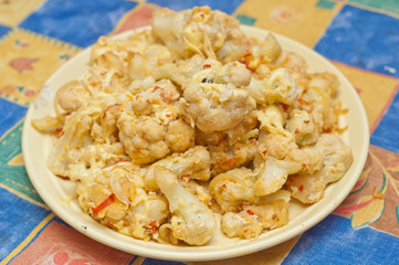 Roasted cauliflower in egg and breadcrumbs and cheese