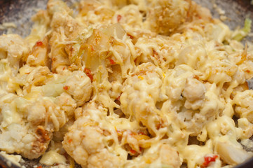 Roasted cauliflower in egg and breadcrumbs and cheese